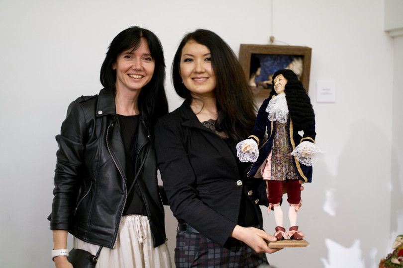 Italian opera singer Ayanа Sambuu and Marianna Abramova with designer doll by Lidia Grinko