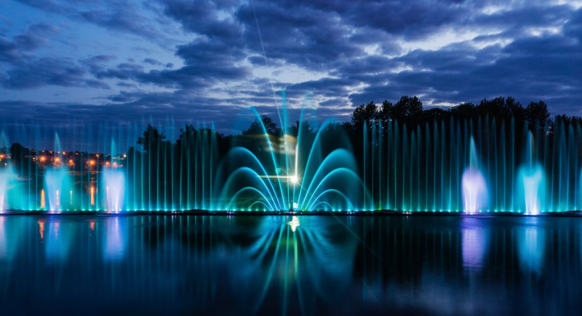 fountains with lights in evening