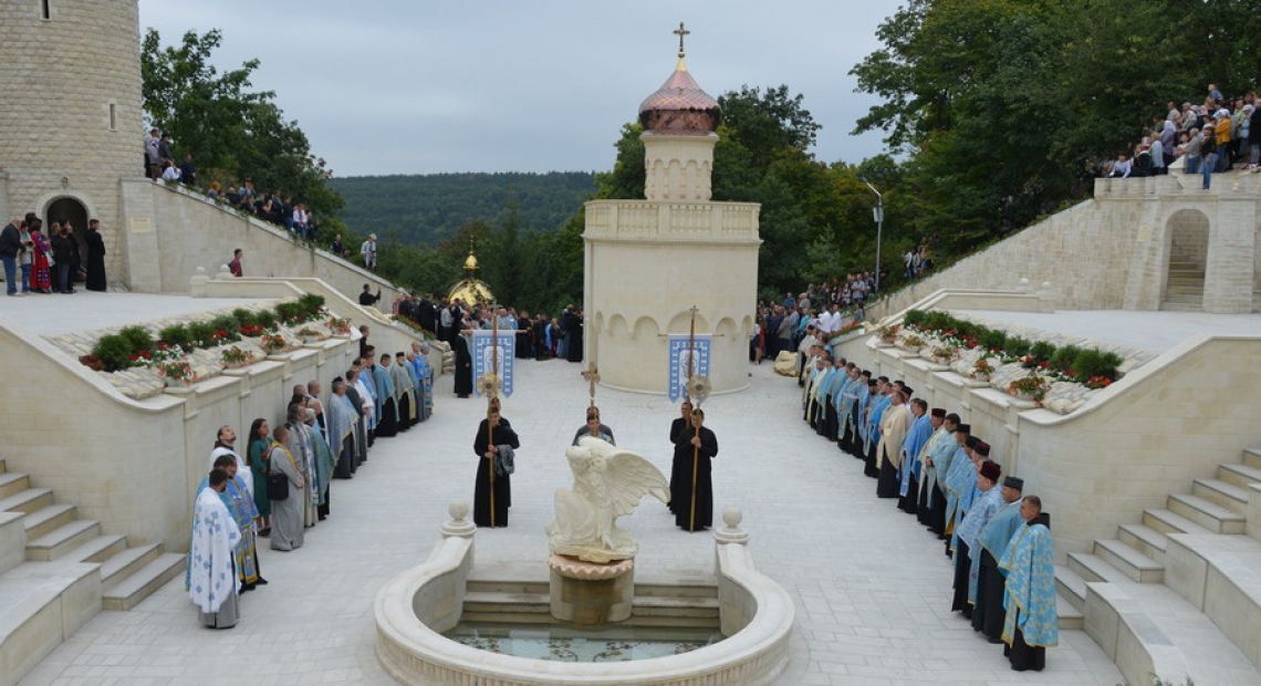 Priests sanctifying a church complex in Ukraine