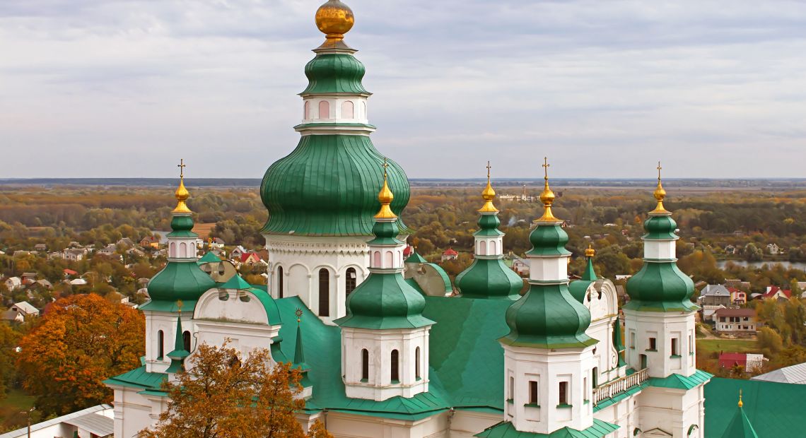 Church with green-and-golden domes in Chernigiv