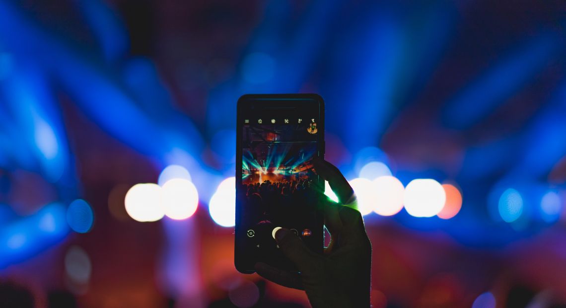 Man filming the concert