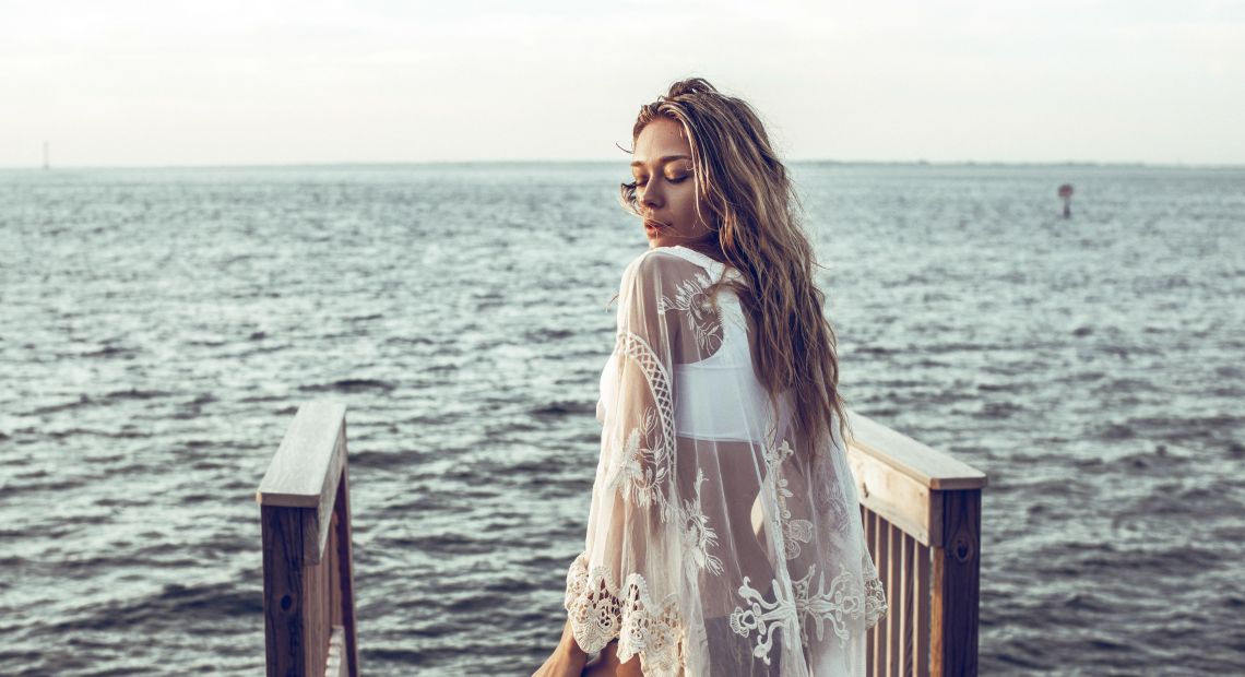 Girl posing near the sea