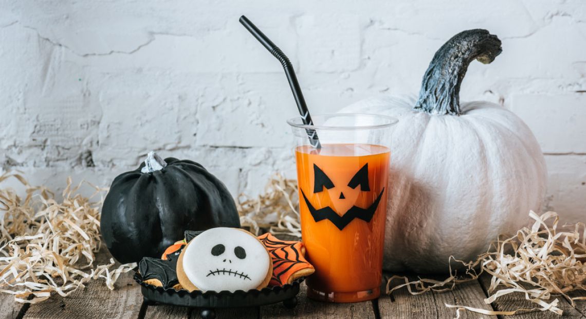 Jack-o-lantern and a spooky glass of juice