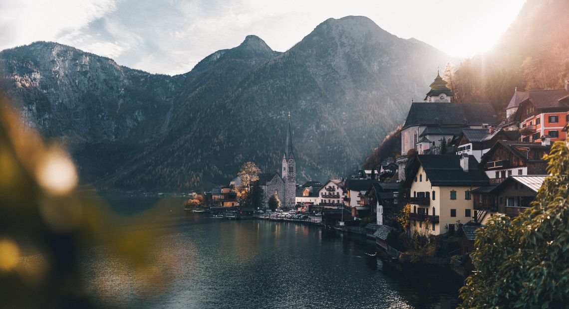 houses, mountains and lake