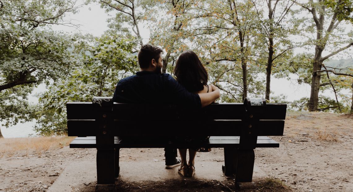 romantic couple on bench