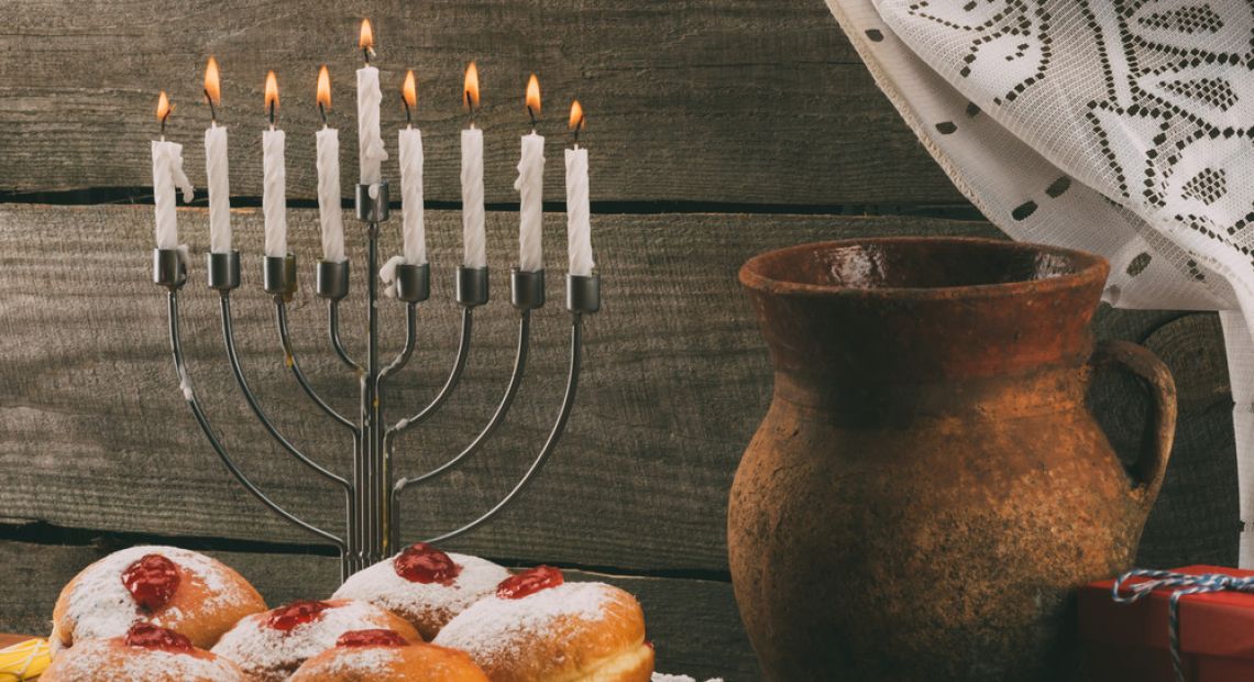 A menorah, sufganiyot and oil
