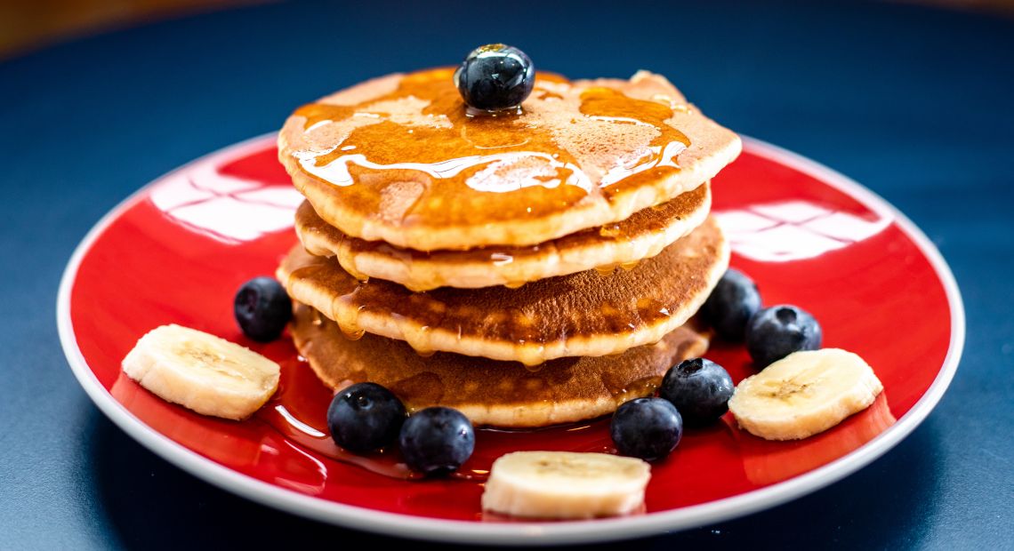 Delicious pancakes with maple syrup