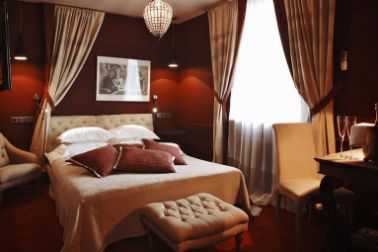 hotel room interior in red and beige colors