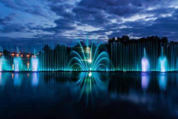 fountains with lights in evening