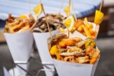 delicious street food decorated with oranges