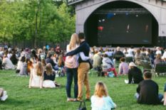 Couple hugging on an outdoor movie showing