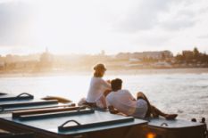 Couple resting near water