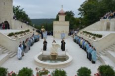 Priests sanctifying a church complex in Ukraine