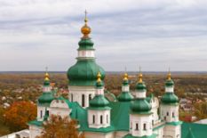 Church with green-and-golden domes in Chernigiv