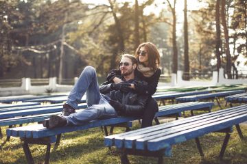 Young couple walking in an autumn park