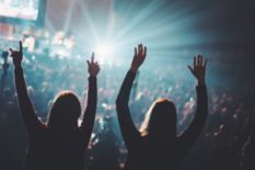 two girls in crowd at concert