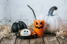 Jack-o-lantern and a spooky glass of juice