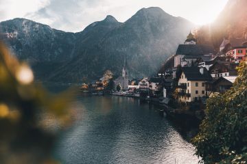 houses, mountains and lake