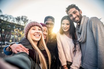 group of friends in winter outdoors