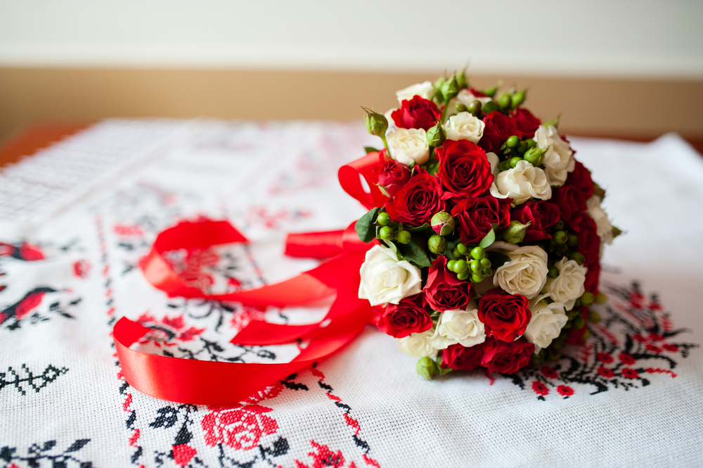 Wedding bouquet on embroidered cloth