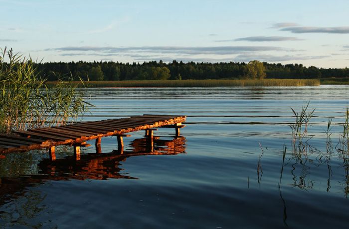 wooden pier on large lake