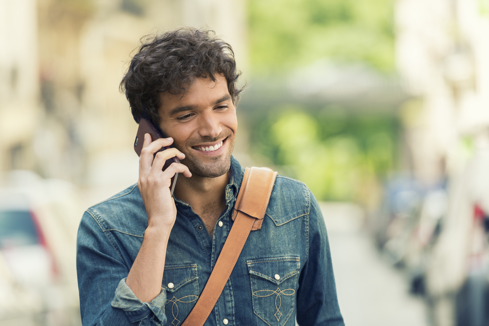 young man talking on mobile phone