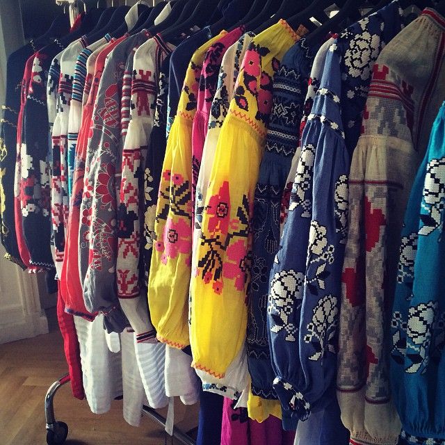 many colorful vyshyvankas on hangers