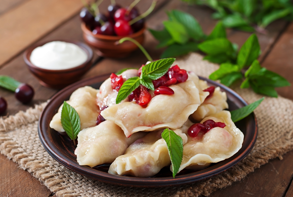 Varenyky with cherries on the table