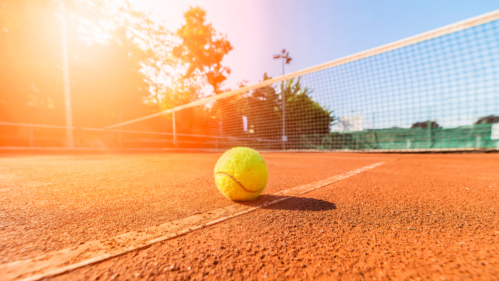 Tennis ball on a court