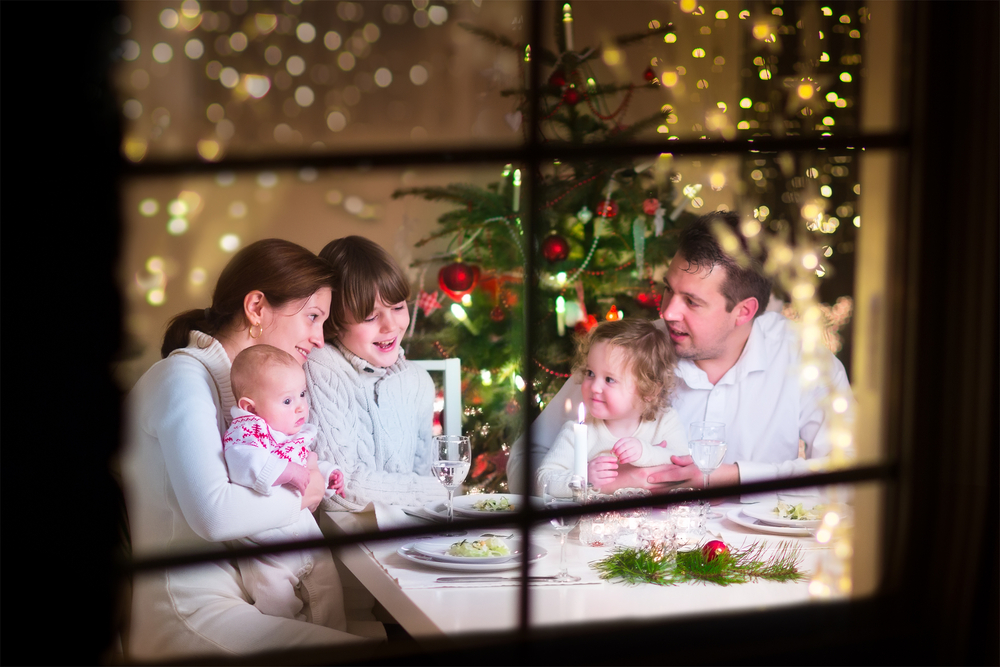 family enjoying Christmas dinner