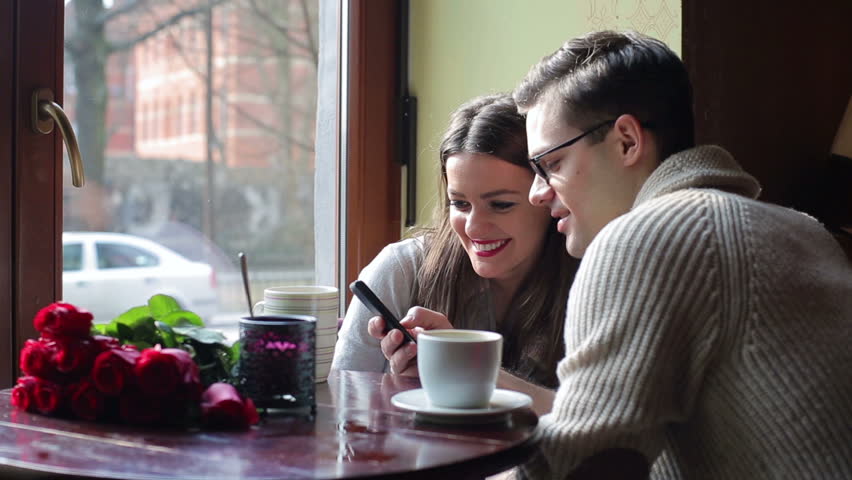 young couple in cafe