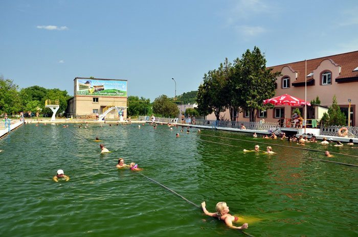 people bathing in pool