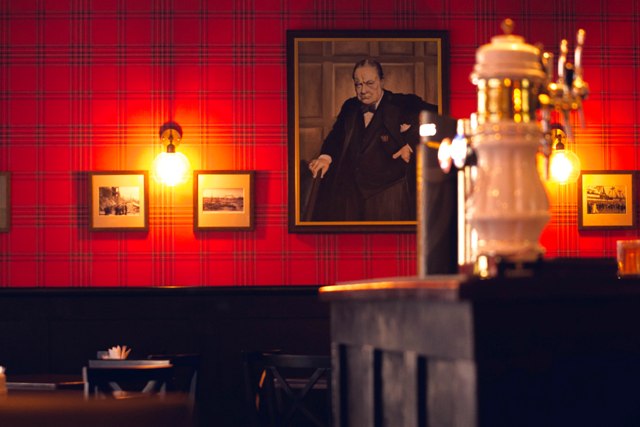 portrait of Winston Churchill in pub