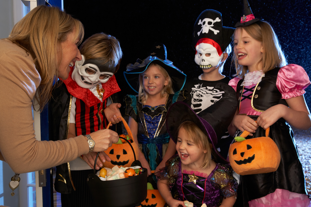 Kids choosing candy for Halloween