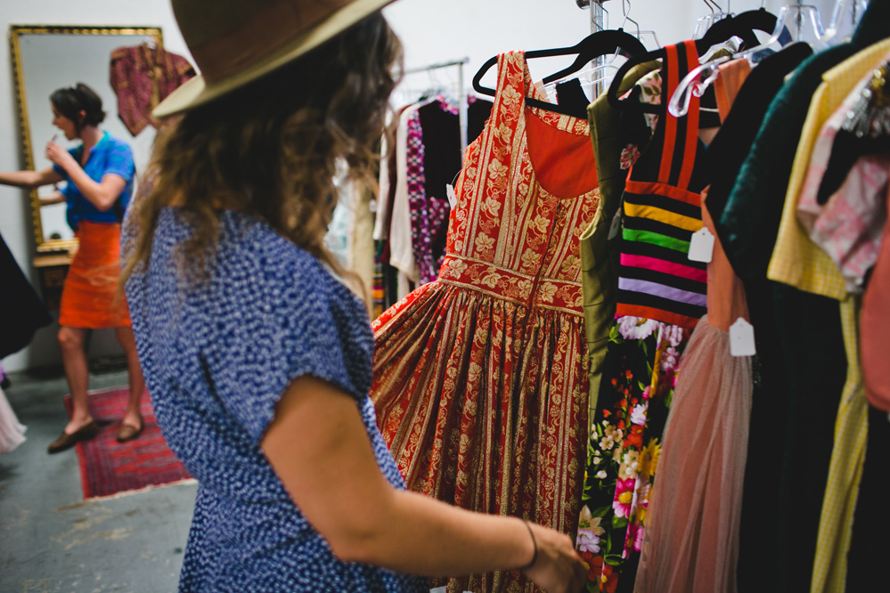 Woman checking out a vintage dress