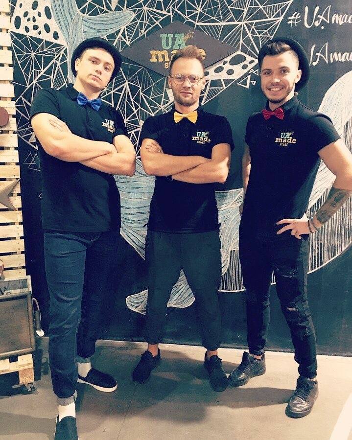 three men in fashion store