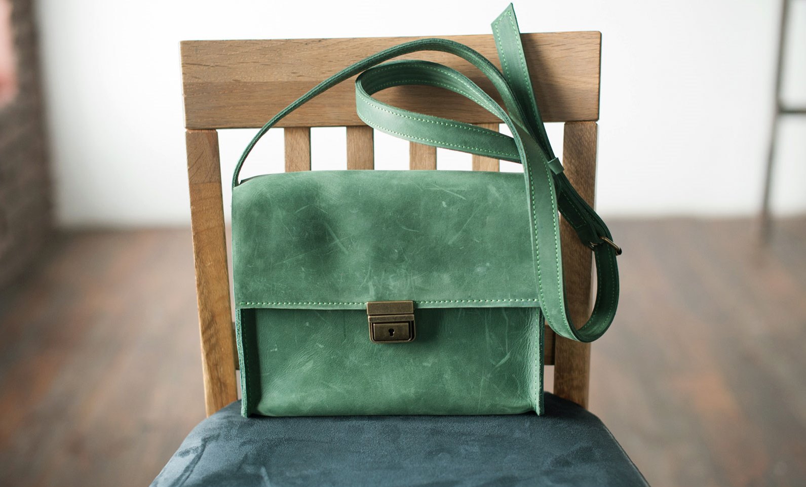 green bag on chair