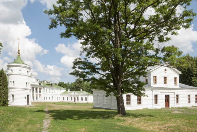 white buildings in green garden