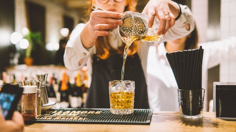 Bartender pouring a drink