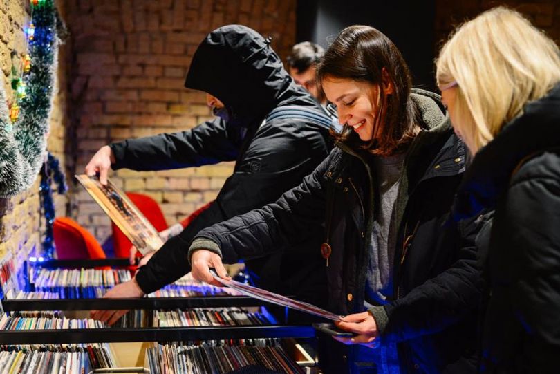 People choosing vinyl at Gram in Kyiv