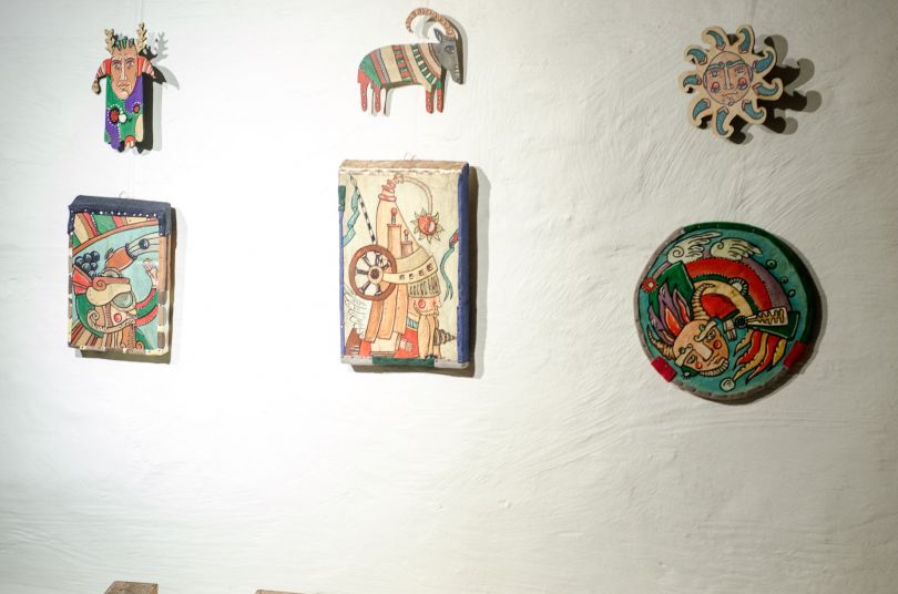 folk artworks on wall
