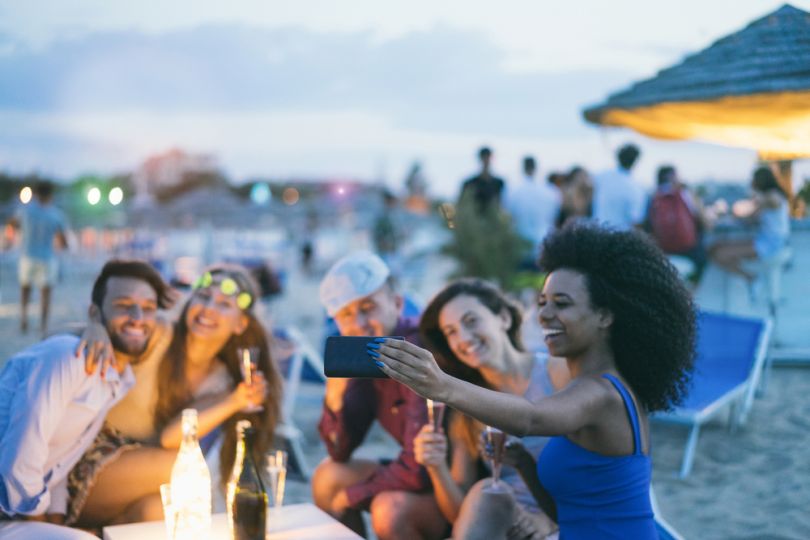 young people partying at beach