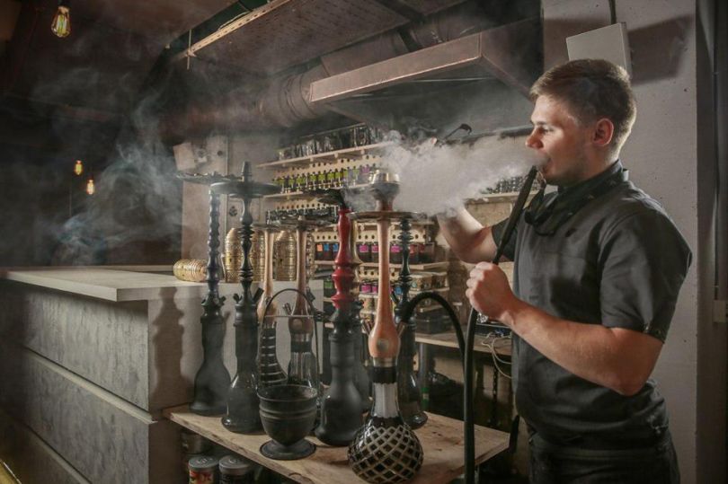 Man preparing hookah