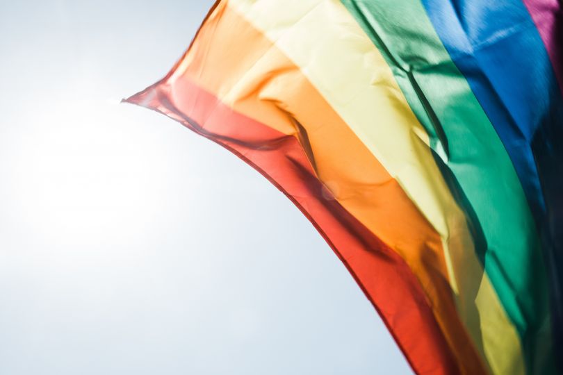 LGBTQ flag flying