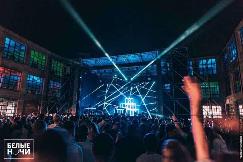 Crowd cheering at a concert