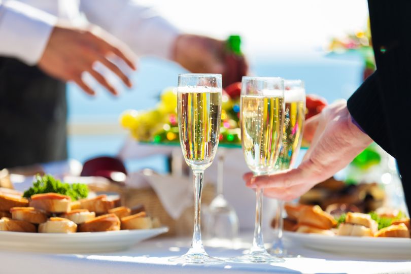 glasses of champagne and food served in seasoast restaurant