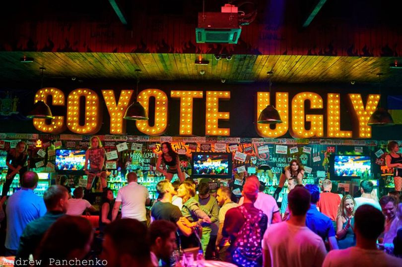 People in Ugly Coyote Saloon in Kyiv