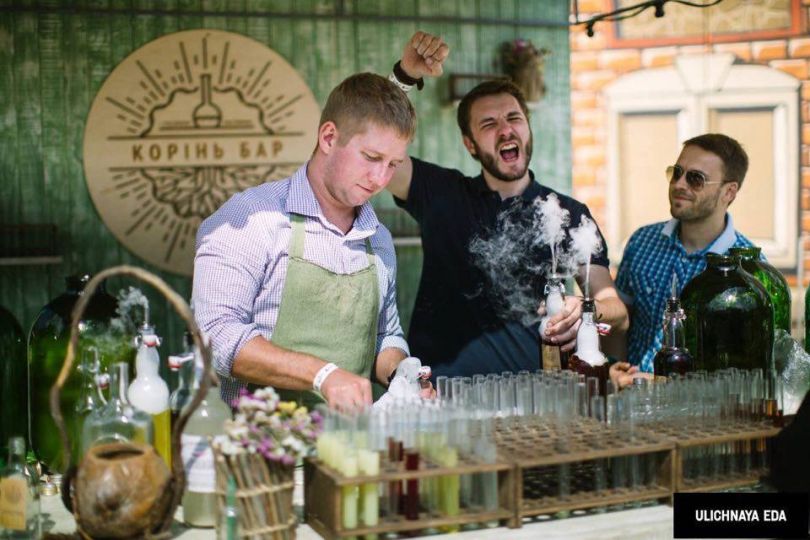 Man mixing drinks in tubes