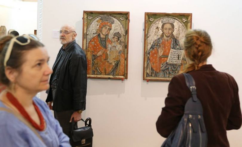 People viewing paintings in the National Museum of Ukrainian art