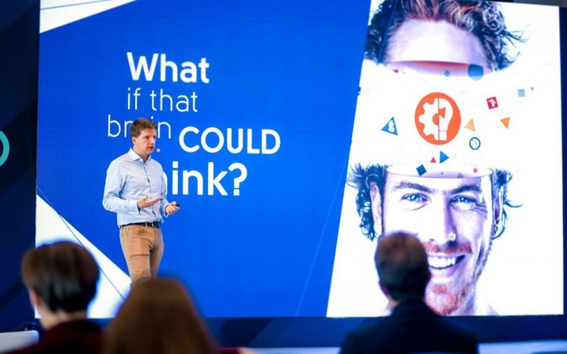 Man talking at an IT conference